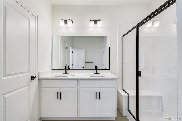 9360 Bahama Ct, Commerce City, CO 80022 - bathroom featuring a shower stall and double vanity