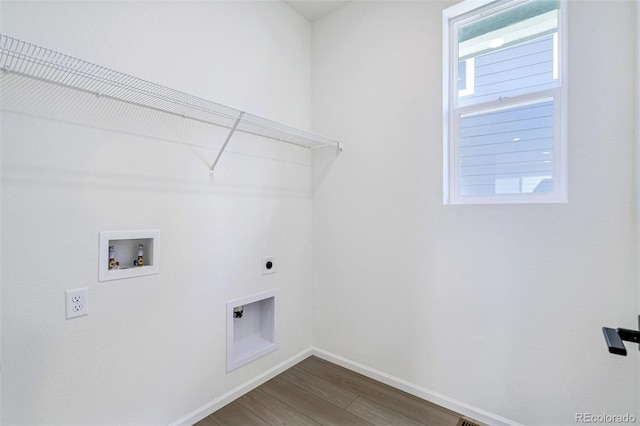 9360 Bahama Ct, Commerce City, CO 80022 - washroom with hookup for an electric dryer, washer hookup, and dark wood-type flooring
