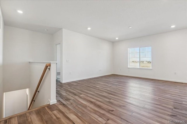 unfurnished room featuring light hardwood / wood-style flooring