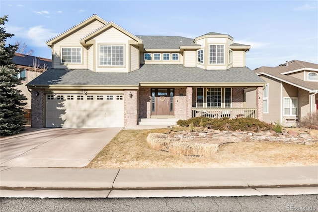 view of front of property with brick siding, a shingled roof, covered porch, an attached garage, and driveway