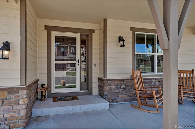 4032 Donnington Cir, Castle Rock, CO 80104 - doorway to property with a porch and stone siding