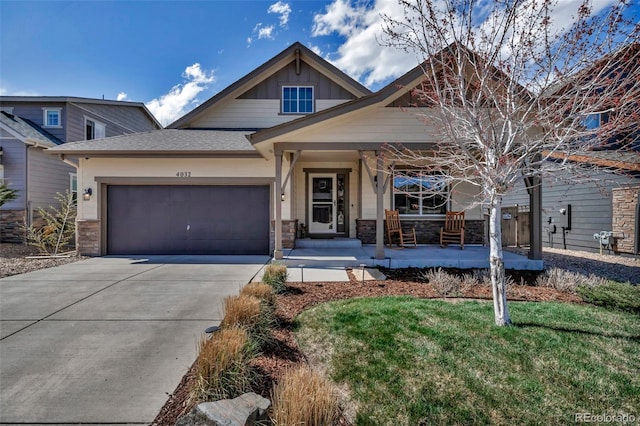 4032 Donnington Cir, Castle Rock, CO 80104 - craftsman-style home featuring a porch, concrete driveway, an attached garage, board and batten siding, and stone siding