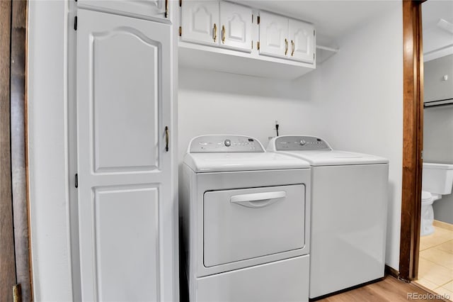 7796 S Marshall Ct, Littleton, CO 80128 - laundry area with washing machine and dryer and cabinet space