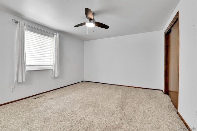 7796 S Marshall Ct, Littleton, CO 80128 - unfurnished bedroom featuring carpet floors, baseboards, and a ceiling fan
