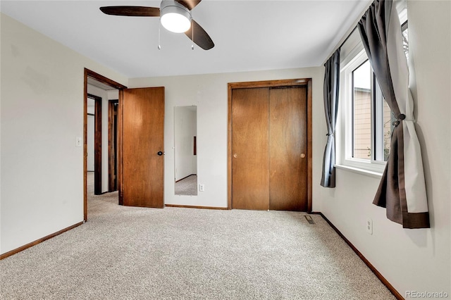 7796 S Marshall Ct, Littleton, CO 80128 - unfurnished bedroom with carpet, a closet, baseboards, and ceiling fan