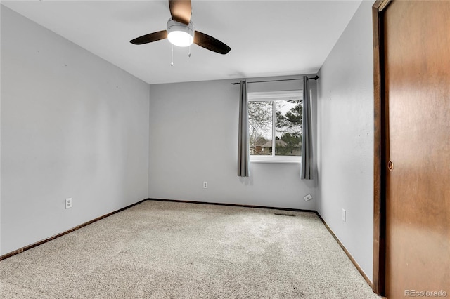7796 S Marshall Ct, Littleton, CO 80128 - spare room featuring a ceiling fan, carpet, and baseboards
