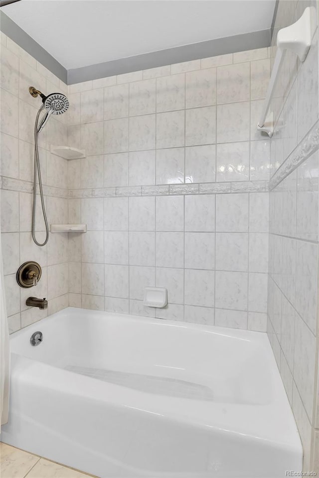 7796 S Marshall Ct, Littleton, CO 80128 - bathroom featuring shower / washtub combination