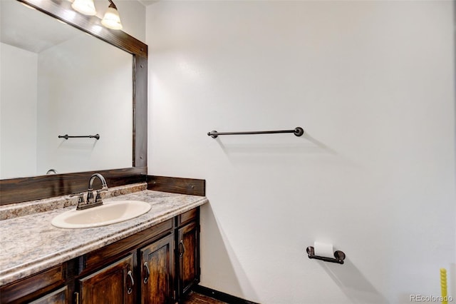 1487 S Zeno Way, Aurora, CO 80017 - bathroom featuring vanity and baseboards