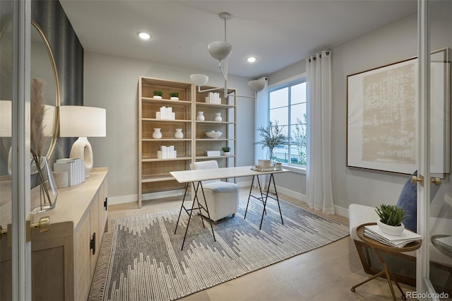 4145 N Duquesne Ct, Aurora, CO 80019 - office featuring baseboards, recessed lighting, and light wood-style floors