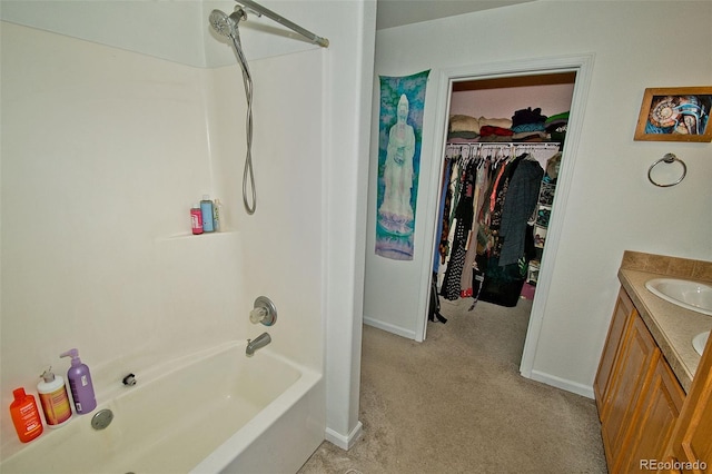 bathroom with shower / bathing tub combination and vanity