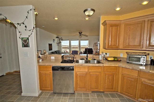 kitchen with sink, dishwasher, and ceiling fan