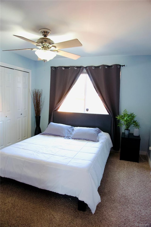 3825 S Monaco Pkwy Unit 111, Denver, CO 80237 - carpeted bedroom featuring a ceiling fan, a closet, and baseboards