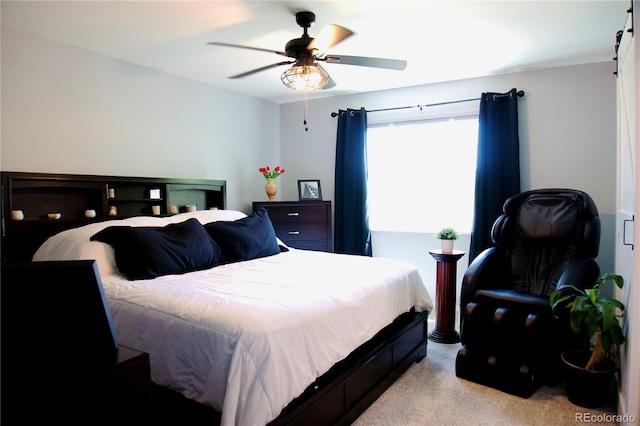 3825 S Monaco Pkwy Unit 111, Denver, CO 80237 - carpeted bedroom featuring a ceiling fan