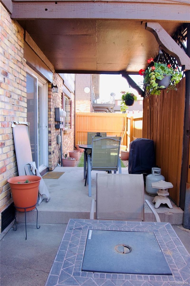 3825 S Monaco Pkwy Unit 111, Denver, CO 80237 - view of patio / terrace featuring outdoor dining area