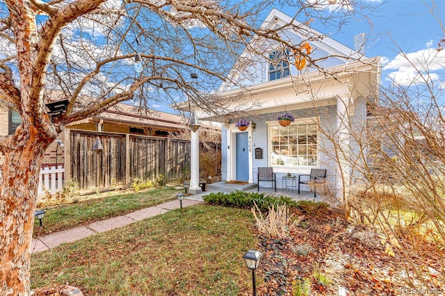 view of front of home with a front yard