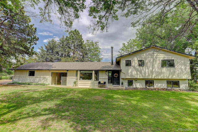 14650 Tejon St, Broomfield, CO 80023 - view of front of home with a front lawn and a shingled roof