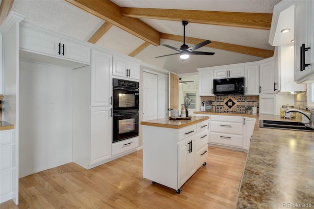 14650 Tejon St, Broomfield, CO 80023 - kitchen with black appliances, a sink, ceiling fan, tasteful backsplash, and white cabinets