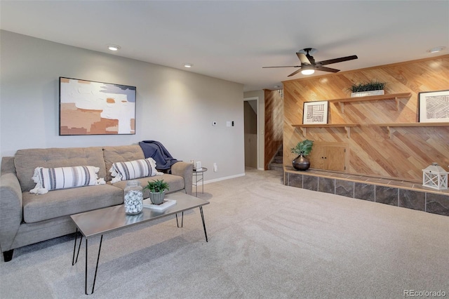 14650 Tejon St, Broomfield, CO 80023 - carpeted living area featuring a ceiling fan, recessed lighting, baseboards, and wood walls