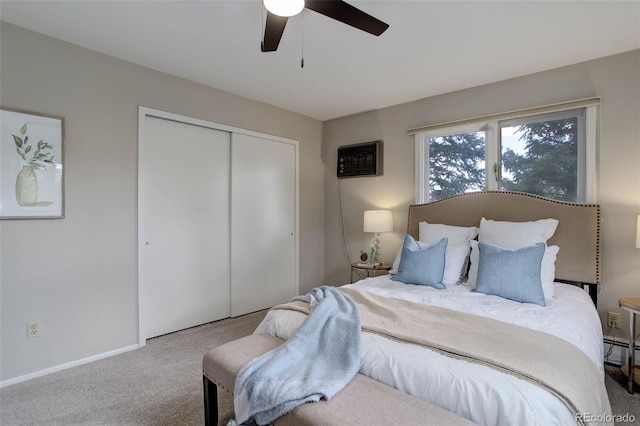 14650 Tejon St, Broomfield, CO 80023 - carpeted bedroom featuring a closet, baseboards, a ceiling fan, baseboard heating, and an AC wall unit