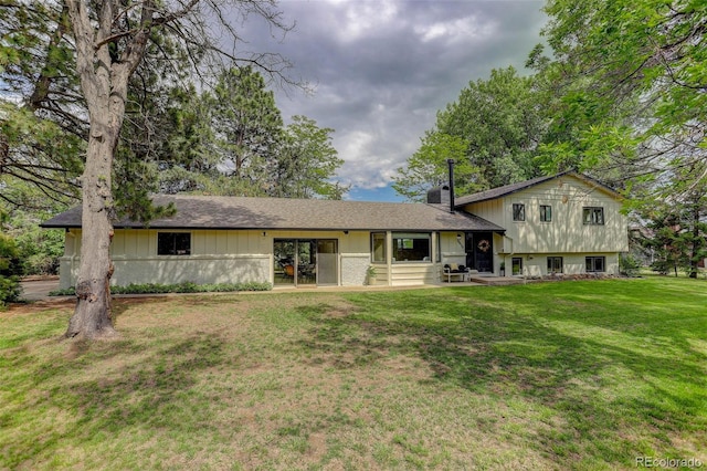 14650 Tejon St, Broomfield, CO 80023 - rear view of house with a yard and a chimney