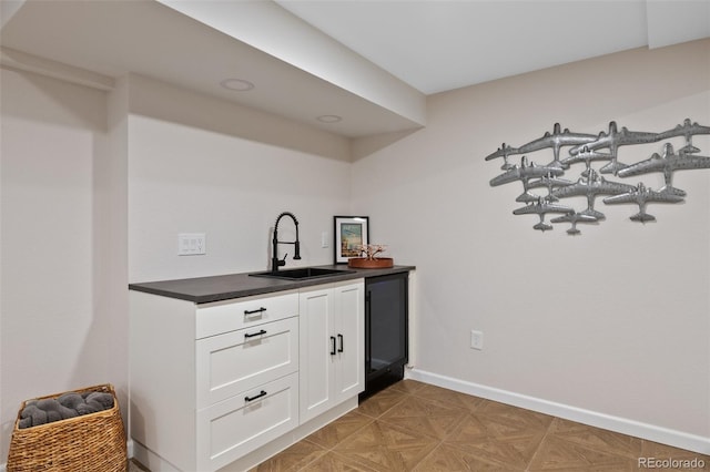 kitchen with white cabinets and sink