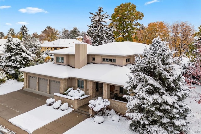 view of front of home with a garage