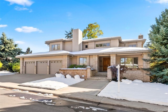 view of front of home with a garage