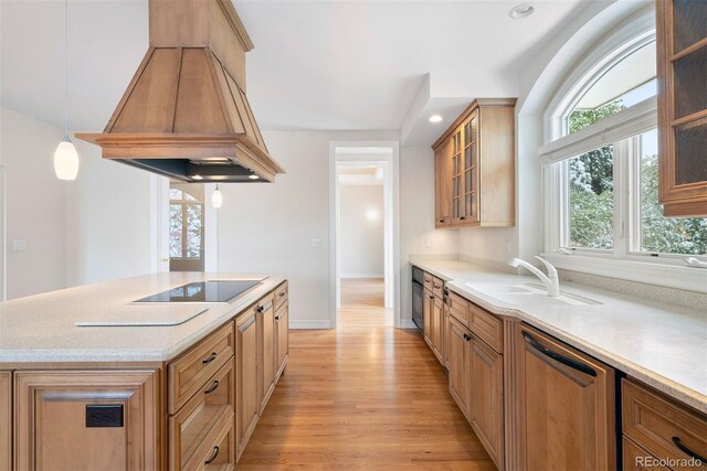 4800 E Cedar Ave, Denver, CO 80246 - kitchen featuring black electric cooktop, a sink, light wood-style floors, paneled dishwasher, and custom exhaust hood
