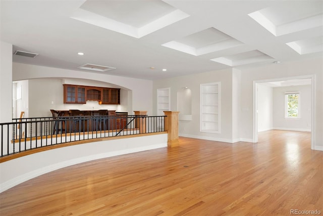 4800 E Cedar Ave, Denver, CO 80246 - empty room with light wood-style floors, built in features, coffered ceiling, baseboards, and recessed lighting