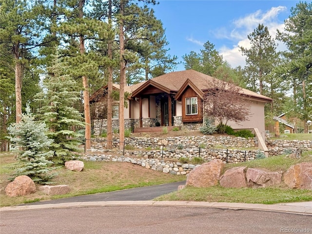 185 Wildrose Ct, Woodland Park, CO 80863 - view of front of property with stone siding
