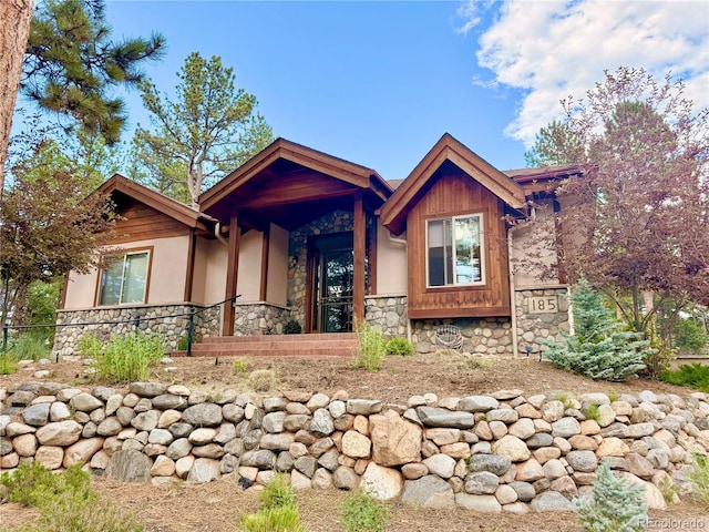 185 Wildrose Ct, Woodland Park, CO 80863 - view of front of house featuring stone siding