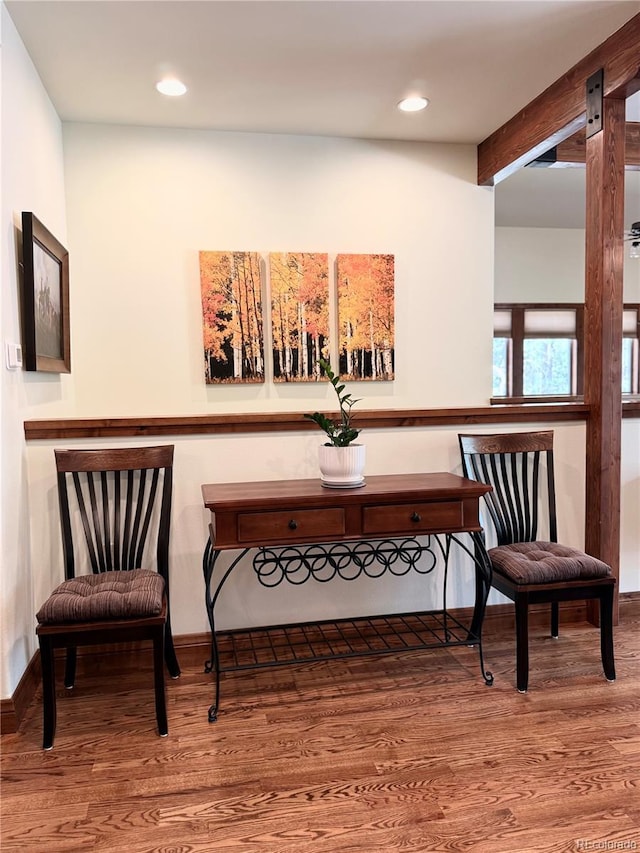 185 Wildrose Ct, Woodland Park, CO 80863 - living area with wood finished floors, recessed lighting, and beamed ceiling