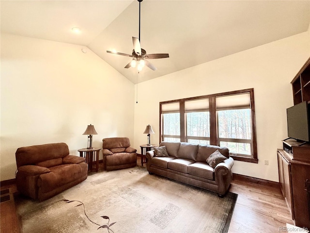 185 Wildrose Ct, Woodland Park, CO 80863 - living room with ceiling fan, light wood-style flooring, and high vaulted ceiling