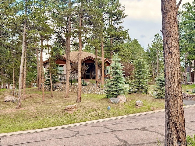 185 Wildrose Ct, Woodland Park, CO 80863 - view of front facade featuring a front lawn