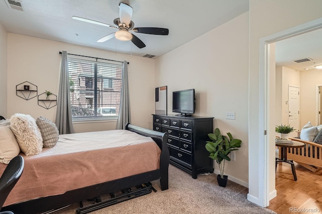bedroom with baseboards and ceiling fan