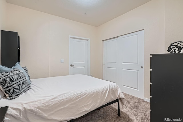 carpeted bedroom with a closet