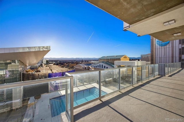 balcony featuring a mountain view