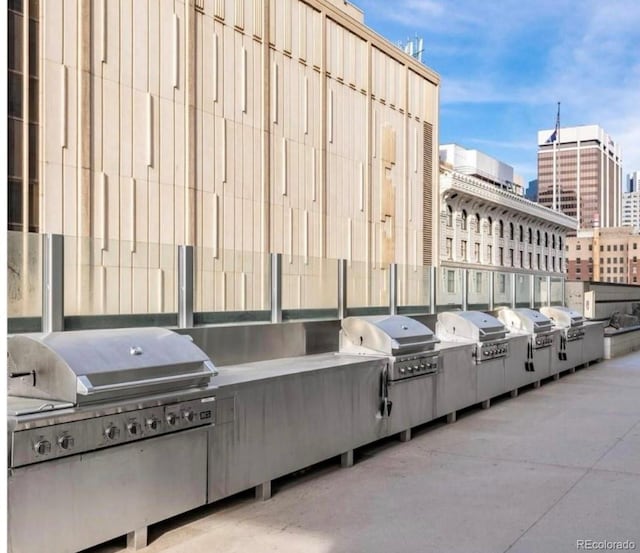 view of patio / terrace featuring an outdoor kitchen and grilling area