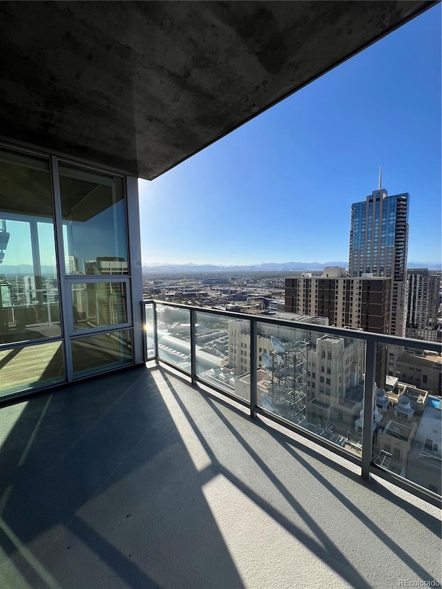 balcony featuring a city view