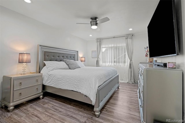 bedroom featuring a ceiling fan, recessed lighting, and wood finished floors