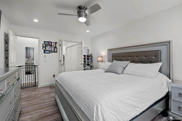 bedroom with recessed lighting, baseboards, a ceiling fan, and dark wood-type flooring