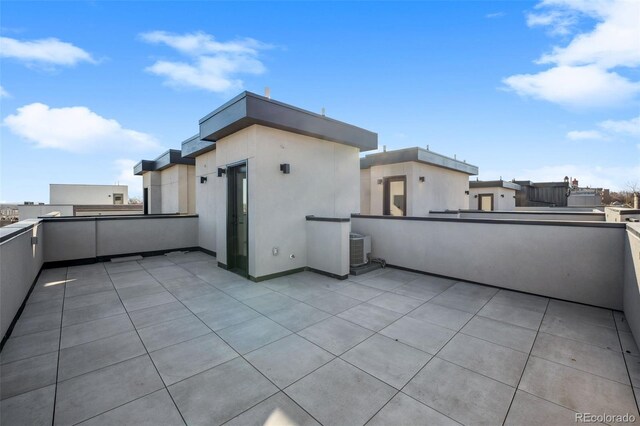 2330 Eliot St Unit 7, Denver, CO 80211 - view of patio with a balcony and central air condition unit