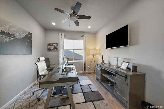 office area with recessed lighting, light wood-style flooring, a ceiling fan, and baseboards