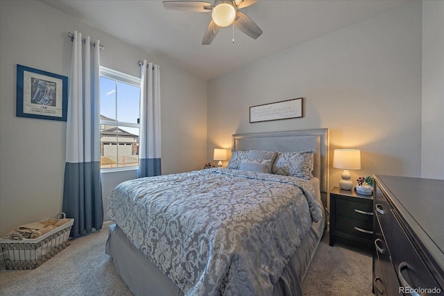 bedroom with light carpet and ceiling fan