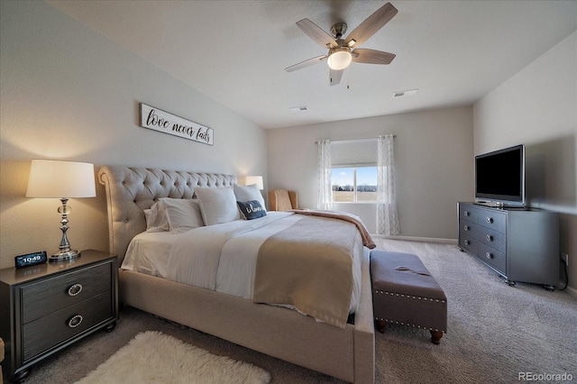 bedroom with a ceiling fan, light colored carpet, and visible vents