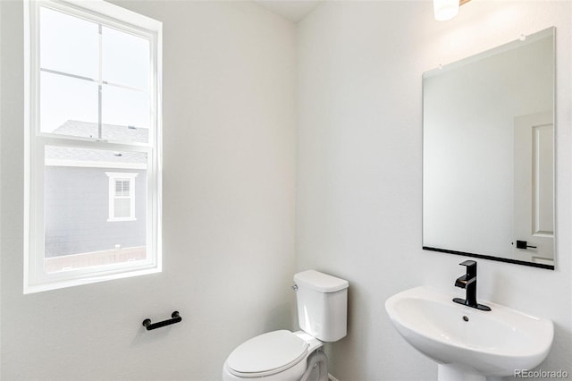 4451 Soapberry Pl, Castle Rock, CO 80108 - half bath featuring a sink and toilet