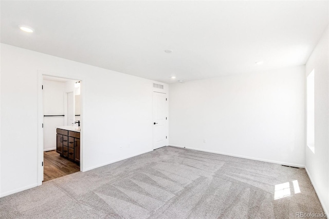 4451 Soapberry Pl, Castle Rock, CO 80108 - carpeted empty room featuring recessed lighting and a sink