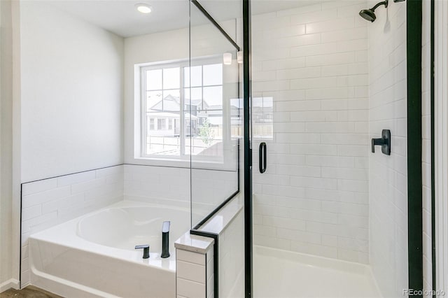 4451 Soapberry Pl, Castle Rock, CO 80108 - full bath featuring a stall shower, a bath, and plenty of natural light