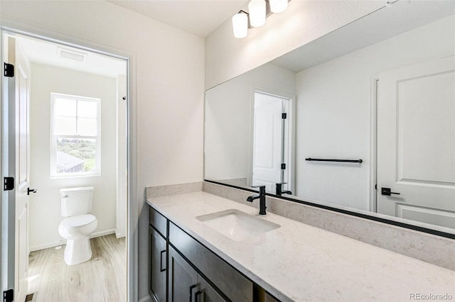 4451 Soapberry Pl, Castle Rock, CO 80108 - bathroom with vanity and wood finished floors