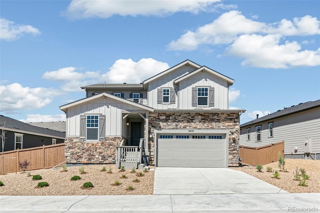 4451 Soapberry Pl, Castle Rock, CO 80108 - craftsman-style home featuring board and batten siding, stone siding, driveway, and an attached garage